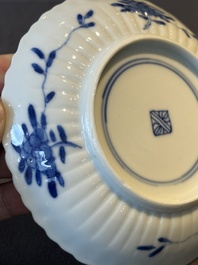 Five fine Chinese blue and white cups and saucers, 19th C.