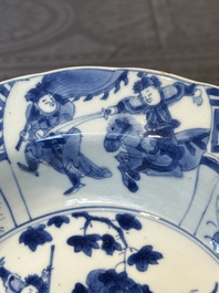 A Chinese blue and white 'hunting scene' 'klapmuts' bowl and a vase with a silver cover, Kangxi