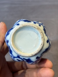 A Chinese blue and white facetted bottle vase with floral design, Kangxi