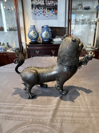 A rare and large Chinese bronze lion-form censer, Southern Song