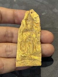 Four sheets of gold repouss&eacute; votive plaques of Buddha Sakyamuni, Burma, 12th C.