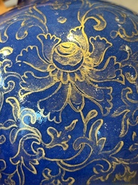 A Chinese gilt-decorated powder-blue kendi with floral design, Kangxi