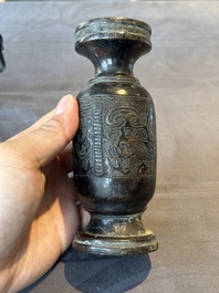 A Chinese bronze vase and a Taoist figure-shaped incense burner, Ming