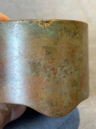 A small Chinese bronze cylindric tripod censer, Xuande mark, Ming