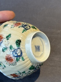 A pair of Chinese famille verte cafe-au-lait-ground cups and saucers, Kangxi