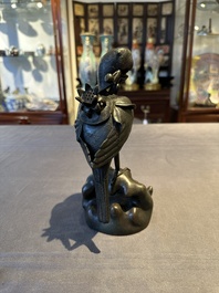 A rare Chinese bronze 'parrot' incense burner, Ming