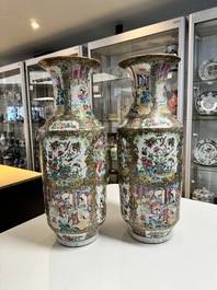A pair of Chinese Canton famille rose vases with figures, flowers and insects, 19th C.