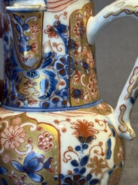 A Chinese English-decorated blue and white jug and cover, Kangxi