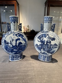 A pair of Chinese blue and white moonflasks or 'bianhu', Kangxi mark, 19th C.