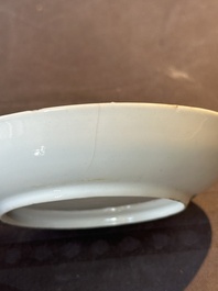 A Chinese Canton famille rose 'mandarin subject' covered teapot and a pair of saucers, Qianlong