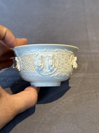 A pair of rare Chinese reticulated white-glazed biscuit 'Eight Immortals and Shoulao' bowls, Wanli