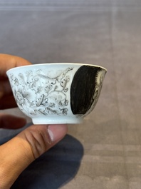 A rare Chinese grisaille and gilt cup and saucer with Ignatius of Loyola, Qianlong