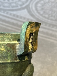 Two Chinese archaic bronze food vessels, 'ding 鼎', Han