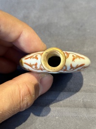 A fine Chinese famille rose snuff bottle with rock crystal stopper, Qianlong mark and of the period