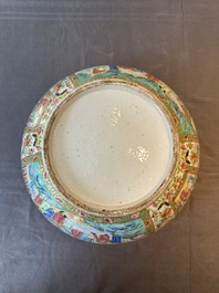 A large Chinese Canton famille rose bowl with a bronze stand, 19th C.