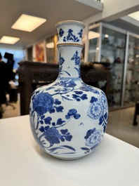 A Chinese blue and white bottle-shaped huqqa base with floral design for the Islamic market, Kangxi