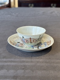 A Chinese famille rose cup and saucer with music making ladies, Yongzheng/Qianlong