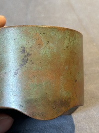 A small Chinese bronze cylindric tripod censer, Xuande mark, Ming