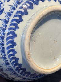 A Chinese blue and white 'lotus scroll' bottle vase, Transitional period