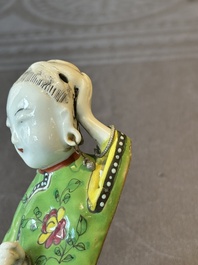 Two Chinese famille rose reclining figures, 19th C.