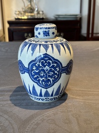 A Chinese blue and white covered jar with floral design, Kangxi