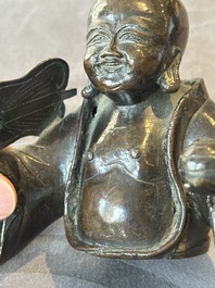 A Chinese bronze vase and a Taoist figure-shaped incense burner, Ming
