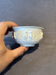 A pair of rare Chinese reticulated white-glazed biscuit 'Eight Immortals and Shoulao' bowls, Wanli