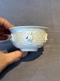 A pair of rare Chinese reticulated white-glazed biscuit 'Eight Immortals and Shoulao' bowls, Wanli