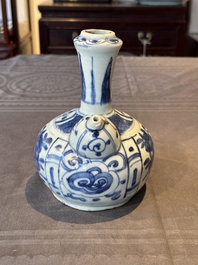 A Chinese blue and white kendi with floral design, Wanli