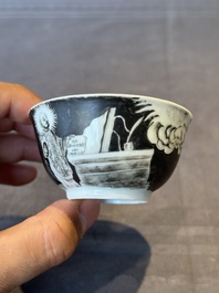 A rare Chinese grisaille and gilt cup and saucer with Ignatius of Loyola, Qianlong