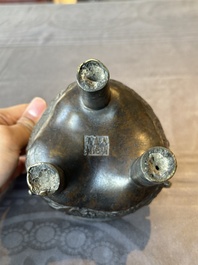 A fine Chinese bronze censer and cover with a Buddhist lion, 'ding 鼎', Xuande Mark, Ming