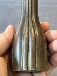 A rare Chinese ribbed bronze flower arranging vase, Ming