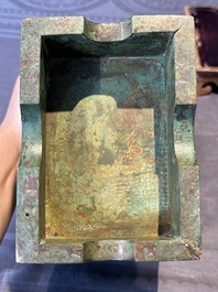 A rare large and inscribed archaistic bronze wine vessel, 'fang yi 方彝', Song/Ming
