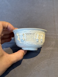 A pair of rare Chinese reticulated white-glazed biscuit 'Eight Immortals and Shoulao' bowls, Wanli