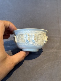 A pair of rare Chinese reticulated white-glazed biscuit 'Eight Immortals and Shoulao' bowls, Wanli