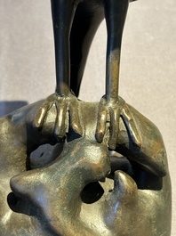 A rare Chinese bronze 'parrot' incense burner, Ming
