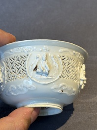 A pair of rare Chinese reticulated white-glazed biscuit 'Eight Immortals and Shoulao' bowls, Wanli