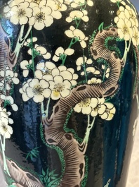 A Chinese famille verte black-ground vase and a pair of turquoise-glazed Buddhist lions, 19/20th C.