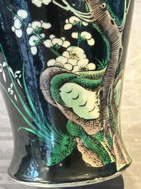 A Chinese famille verte black-ground vase and a pair of turquoise-glazed Buddhist lions, 19/20th C.