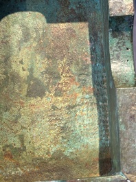 A rare large and inscribed archaistic bronze wine vessel, 'fang yi 方彝', Song/Ming