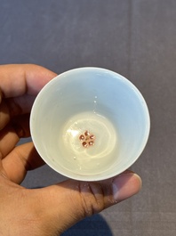 Five Chinese famille rose cups and saucers with horses, birds and flowers, Yongzheng/Qianlong