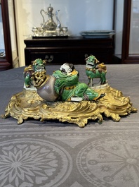 A French ormolu inkwell inset with Chinese verte biscuit porcelain, 19th C. and Kangxi