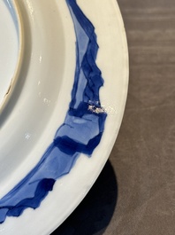A pair of Chinese blue and white 'hunting scene' plates, Qi Yu Bao Ding Zhi Zhen 奇玉寶鼎之珍 mark, Kangxi