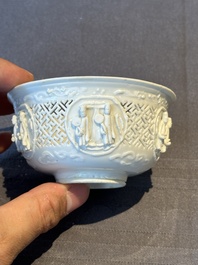 A pair of rare Chinese reticulated white-glazed biscuit 'Eight Immortals and Shoulao' bowls, Wanli