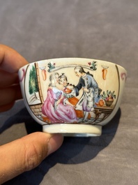 Three Chinese export famille rose 'European subject' cups and two saucers, Qianlong