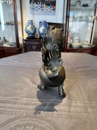 A rare and large Chinese bronze lion-form censer, Southern Song
