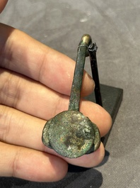 A varied collection of six Chinese bronze belt hooks, Warring States period and Western Han