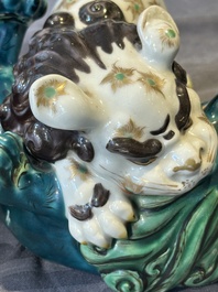 A Japanese polychrome-glazed group of playing Buddhist lions, 18/19th C.