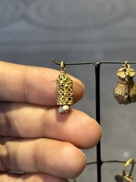 Three pairs of gold earrings with pearls and two gold pendants, Roman Era, 2nd/3rd C.