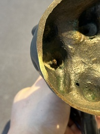A rare Chinese bronze 'parrot' incense burner, Ming